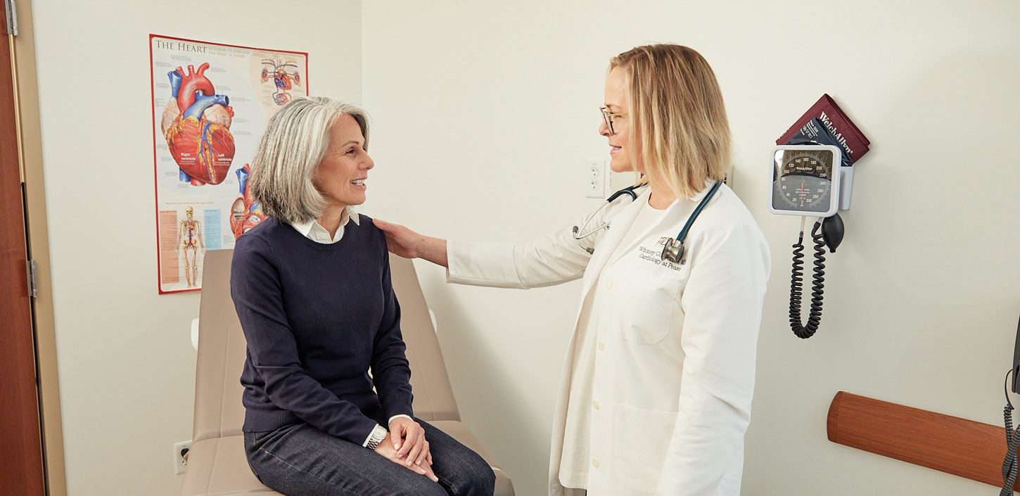 Wentworth-Douglass Hospital Women’s Health Care Provider meeting with a patient.