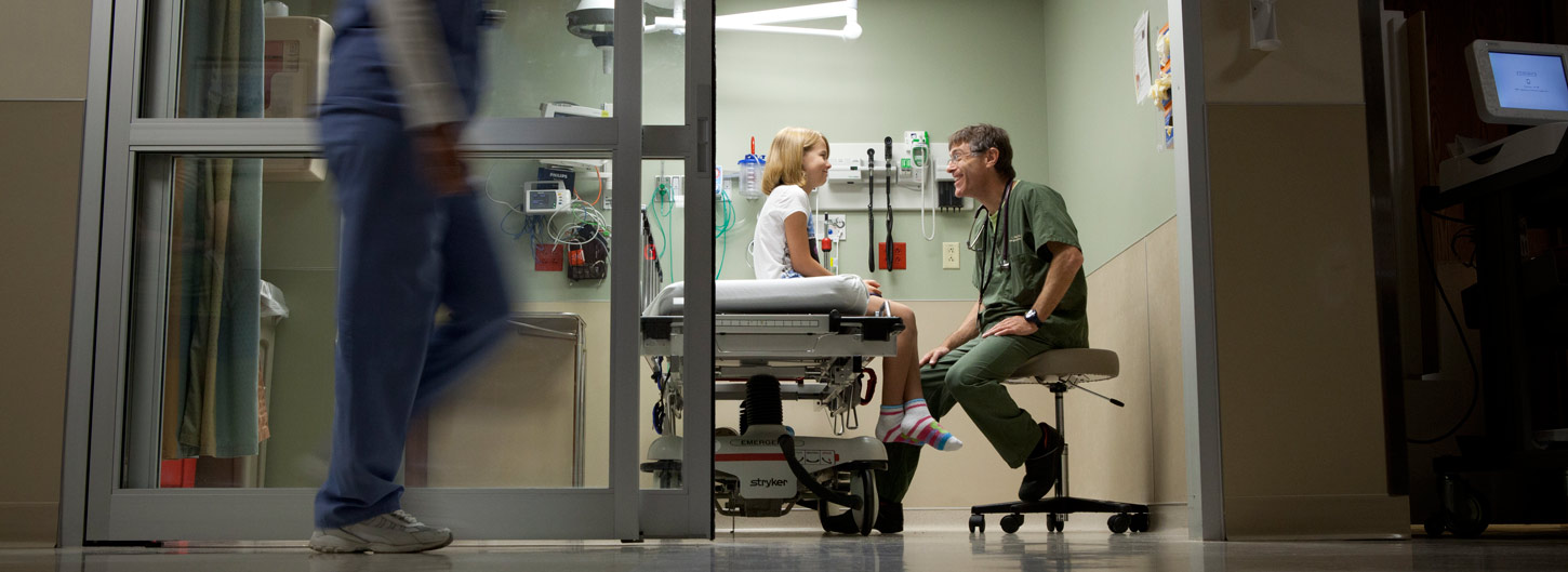 Patient with a provider in the Wentworth-Douglass Hospital Emergency Room.